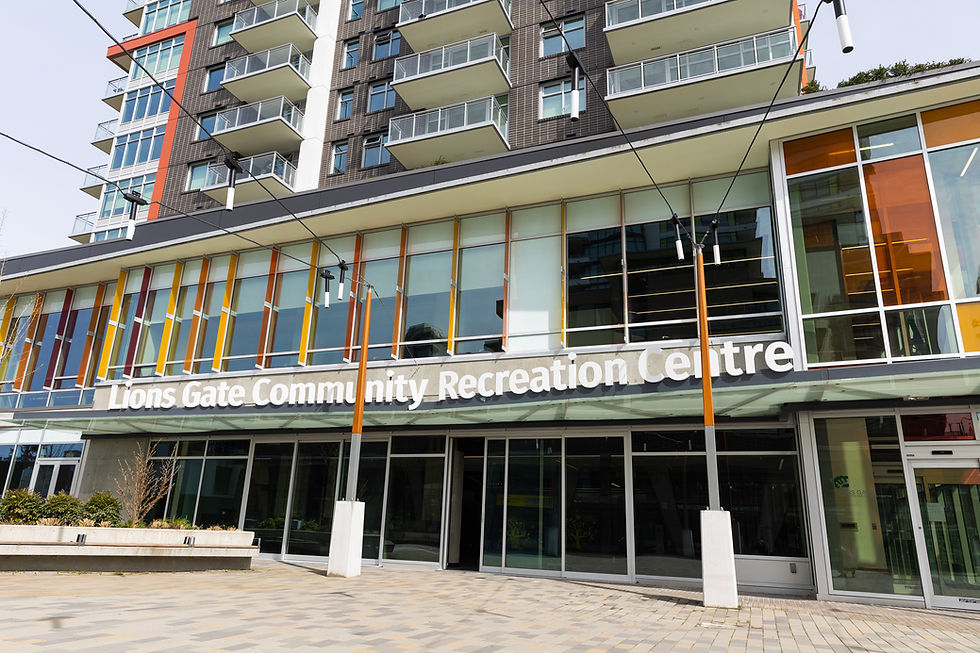 Exterior of Lions Gate Community Recreation Center which is located at the bottom of a high-rise building.